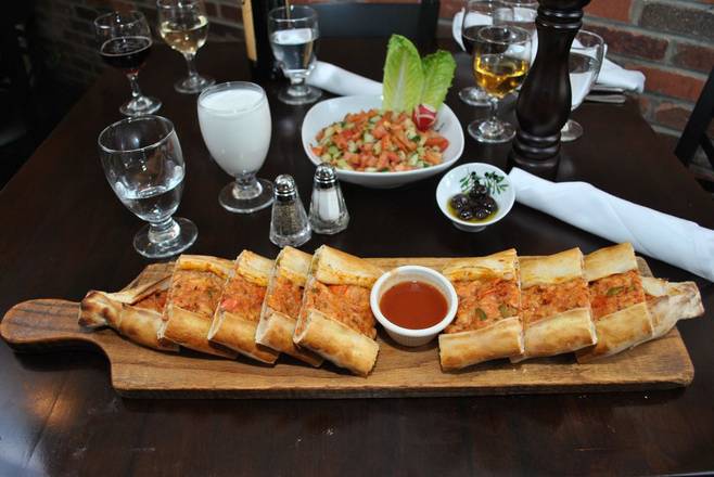 Order Chicken Pide food online from Europe Cafe & Grill store, Tenafly on bringmethat.com