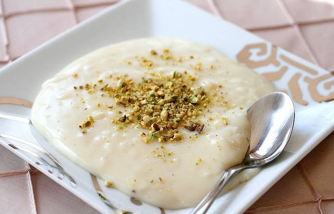 Order Rice Pudding w/ pistachio food online from Habeeb Grill By Pita Grill And Creperie store, Franklin on bringmethat.com