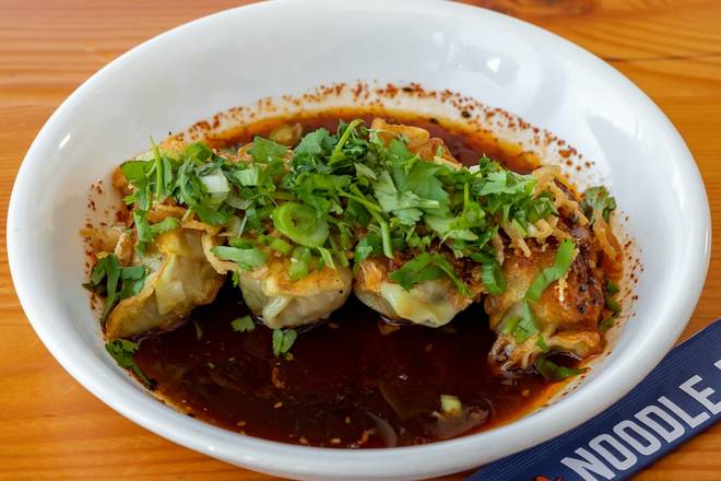 Order Red Oil Dumplings food online from Mecha Noodle Bar store, New Haven on bringmethat.com