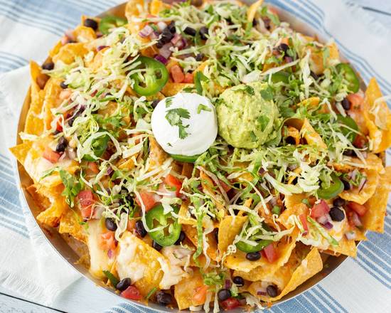 Order Knock Out Nachos food online from Max & Ermas Restaurants store, Monroeville on bringmethat.com