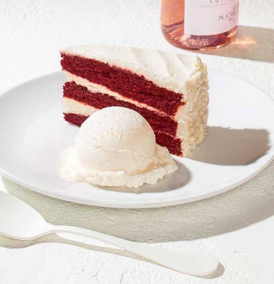 Order RED VELVET CAKE food online from California Pizza Kitchen store, Torrance on bringmethat.com