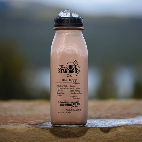 Order Bee Happy Nut Milk 16oz food online from The Juice Standard store, Las Vegas on bringmethat.com