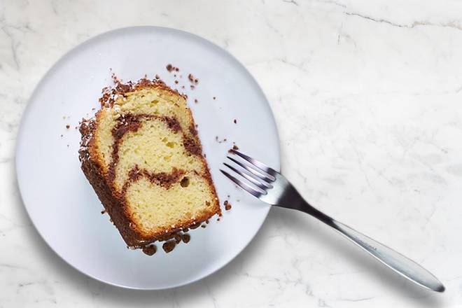Order Cinnamon Creme Cake Slice food online from Corner Bakery store, McAllen on bringmethat.com