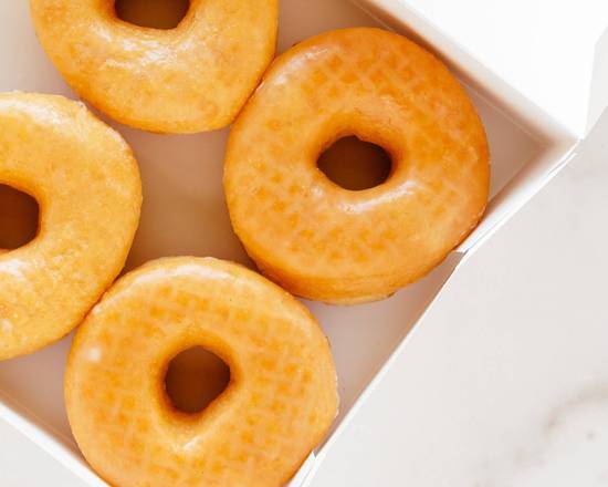 Order Dozen Glazed Donuts food online from Kim's Donuts store, Dallas on bringmethat.com