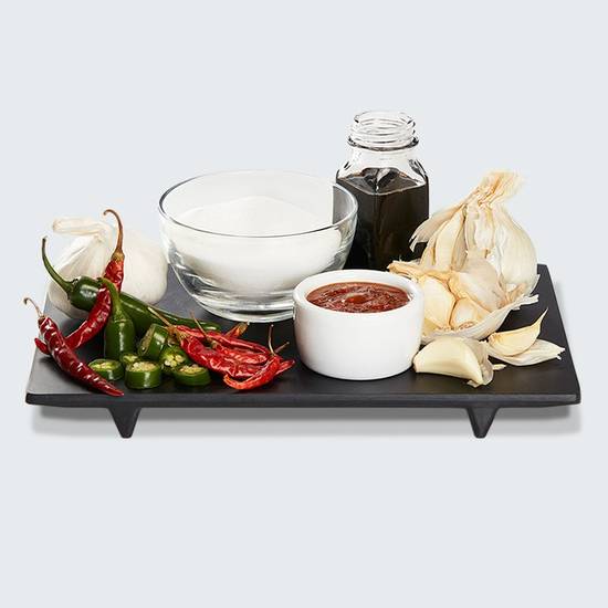 Order Side Garlic Serrano Sauce food online from Waba Grill store, Claremont on bringmethat.com