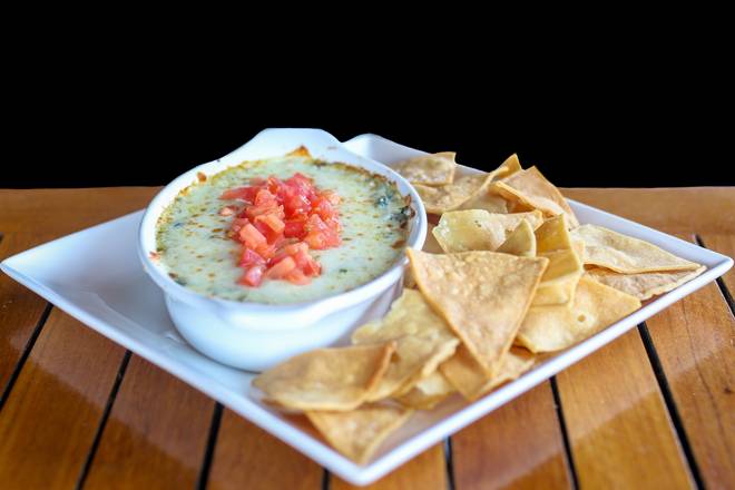 Order Spinach and Artichoke Dip food online from Tommy Tavern + Tap store, Parsippany on bringmethat.com