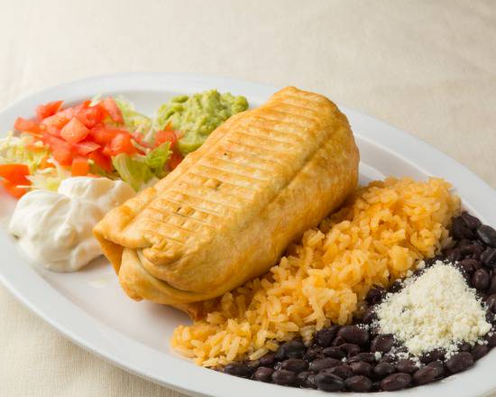 Order Pork Chimichanga (Cerdo) food online from Tacos El Paisanito store, New York on bringmethat.com