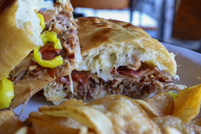 Order Cubana Sandwich food online from Boombozz Taphouse store, Louisville on bringmethat.com