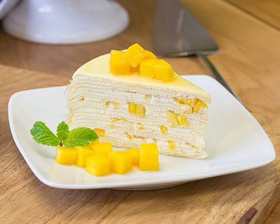 Order Mango Crepe Cake 芒果千层糕 food online from Kazan Ramen & Gyoza store, New York on bringmethat.com