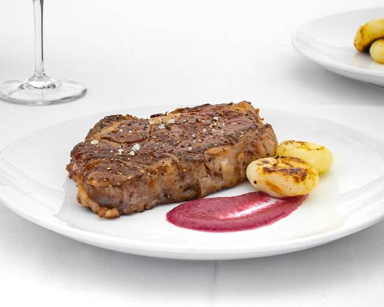 Order Bone-In Ribeye  18oz food online from Orange Hill Restaurant store, Orange on bringmethat.com