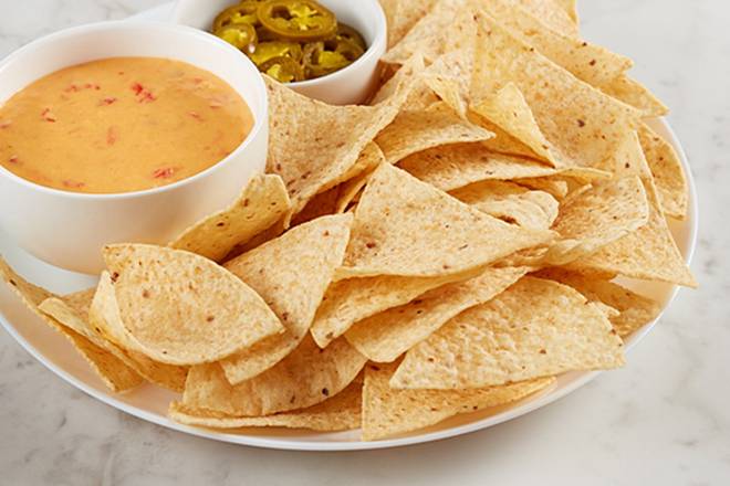 Order Nacho Basket food online from Mcalister's Deli store, Knoxville on bringmethat.com