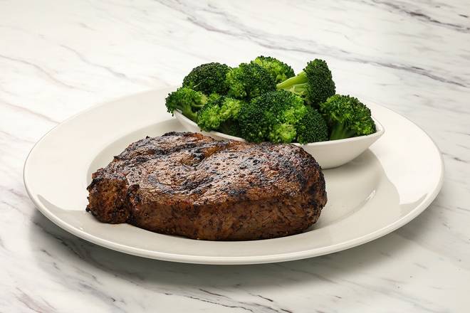 Order Aged Ribeye* food online from Firebirds Wood Fired Grill store, Omaha on bringmethat.com