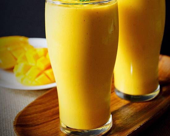 Order MANGO LASSI food online from Bombay Street Food store, Austin on bringmethat.com