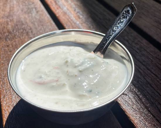Order RAITA food online from Ghee Indian Kitchen store, Miami on bringmethat.com