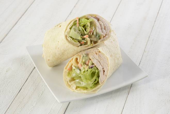 Order Turkey, Swiss, and Slaw Wrap food online from Nature's Table Cafe store, Tampa on bringmethat.com