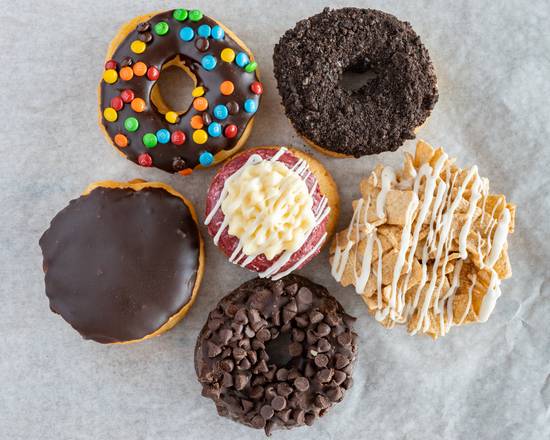 Order Fancy Donuts food online from Cosmic Donuts store, Palm Harbor on bringmethat.com