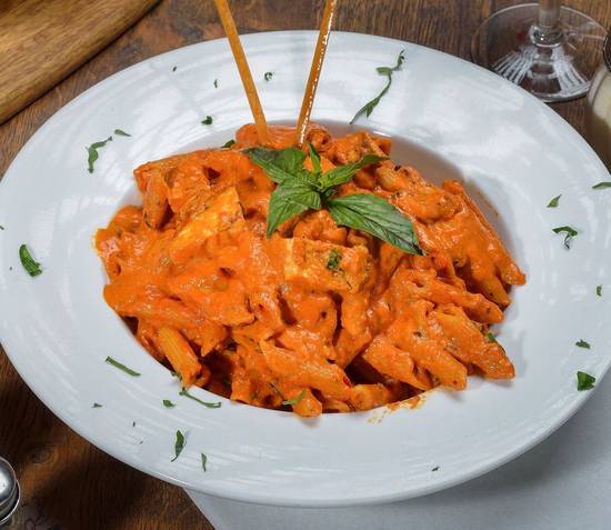 Order Penne Alla Vodka & Chicken Pasta food online from Mangiano Pizza Restaurant & Catering store, Hanover on bringmethat.com