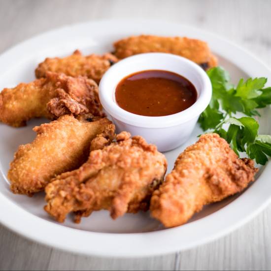 Order 10 Wings with 4 dipping sauces food online from The Great Room Cafe store, Redondo Beach on bringmethat.com