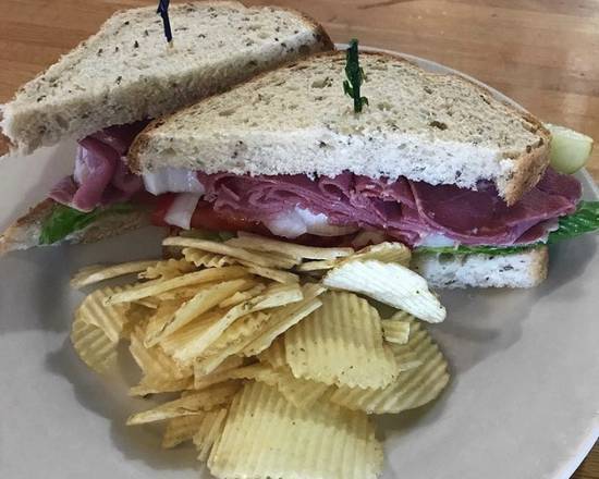 Order Corned Beef on Rye Sandwich food online from Zachary's Restaurant store, Cape Canaveral on bringmethat.com