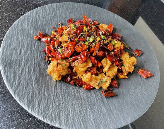 Order CRISPY & SPICY SAVAVORY 辣子 food online from Johnny Carinos Italian Restaurant store, San Antonio on bringmethat.com