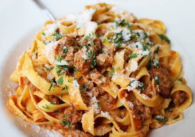 Order Egg Fettuccini with Bolognese  food online from Francescas Pasta Market & Empanadas store, Aspen on bringmethat.com