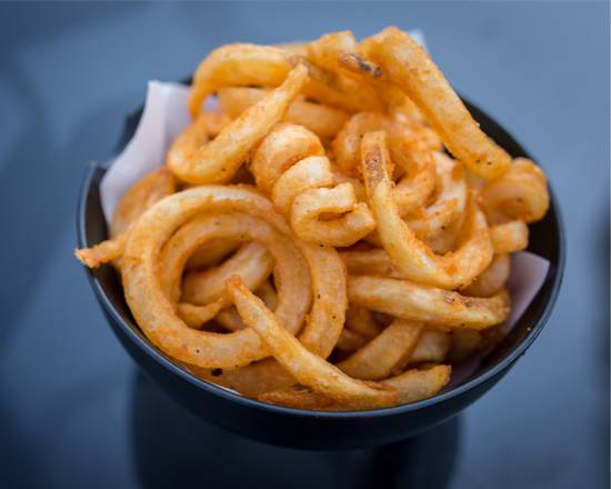 Order Curly Fries food online from The Burger Trilogy store, New York on bringmethat.com