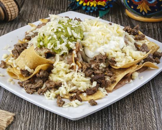 Order Super Carne Asada Nachos food online from Casa Garcia store, Pico Rivera on bringmethat.com