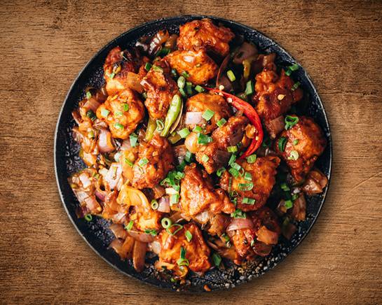 Order Chili Chicken food online from United Kitchens Of India store, Schaumburg on bringmethat.com