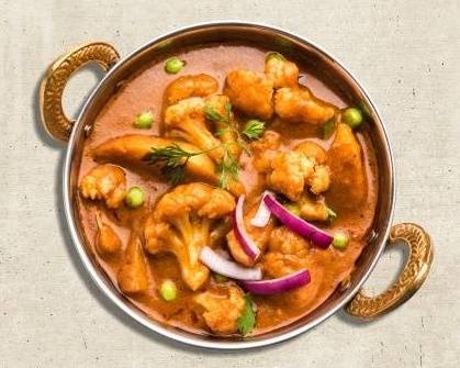 Order Cauli Potato Curry  food online from Vegan Indian Club store, Wichita on bringmethat.com