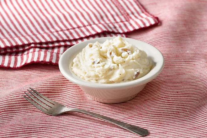 Order Mashed Potatoes with Sawmill Gravy food online from Cracker Barrel Old Country Store store, Somerset on bringmethat.com