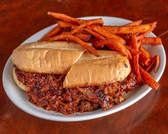 Order BBQ Pulled Pork Sandwich food online from Wild Corgi Pub store, Denver on bringmethat.com