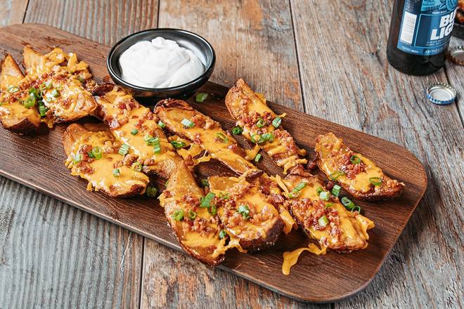 Order Party Pack Made-From-Scratch Potato Skins food online from Logan's Roadhouse store, McAllen on bringmethat.com