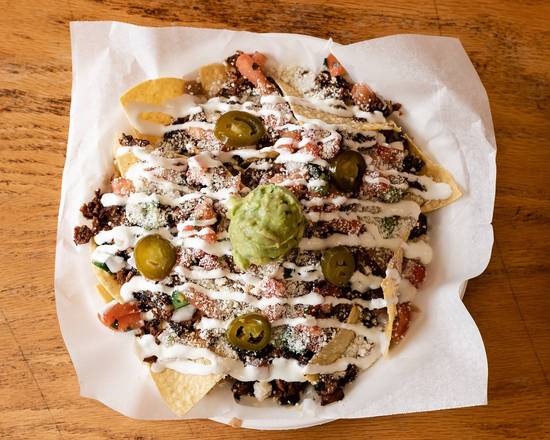Order Nachos food online from Colonial Market and Restaurant store, Minneapolis on bringmethat.com