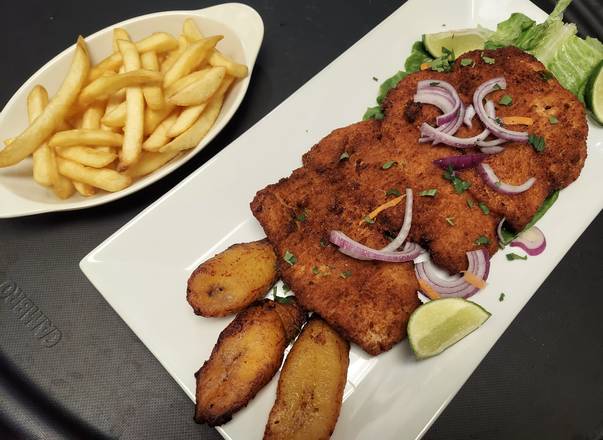 Order Breaded Pork Loin (Chuleta Calena) food online from La Comparsa Bar & Restaurant store, Lauderhill on bringmethat.com
