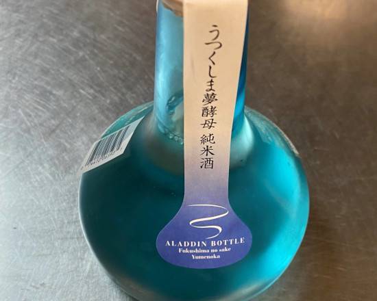 Order Aizu Gomaru Junmai Aladdin, 300mL blue sake (15.5% ABV) food online from Bangkok Fusion Café store, Saint Petersburg on bringmethat.com