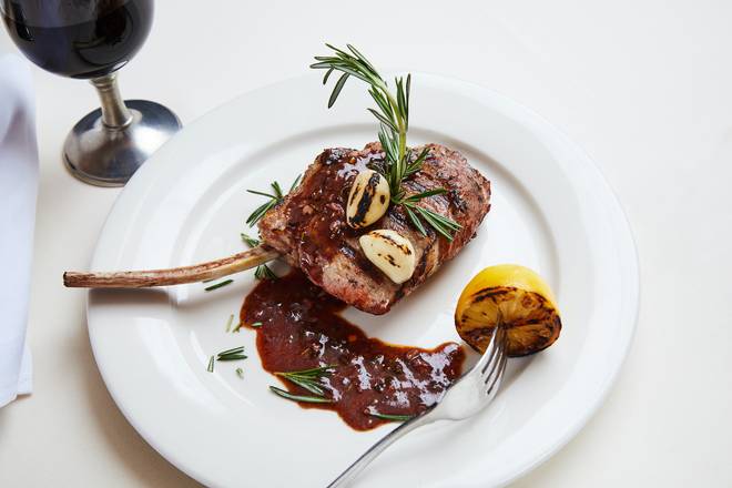 Order Veal Chop (14 oz) food online from Caffe Abbracci store, Miami on bringmethat.com