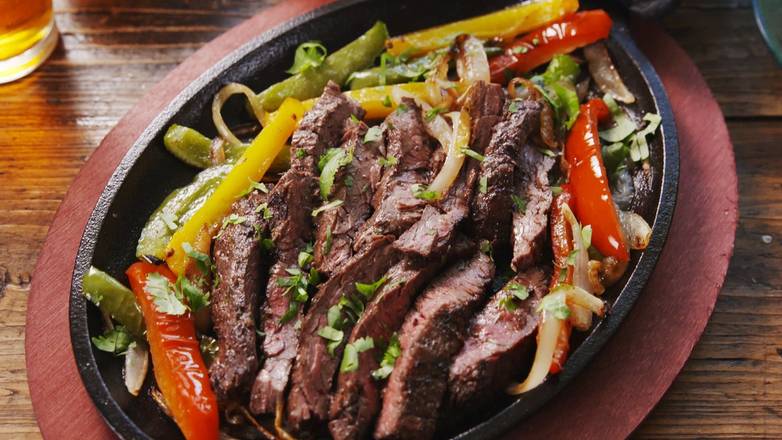 Order STEAK FAJITAS food online from Whiskey Wings store, Largo on bringmethat.com