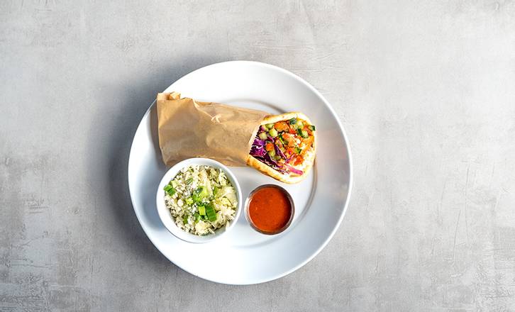 Order Harissa Salmon Pita food online from Zoe Kitchen store, Metairie on bringmethat.com