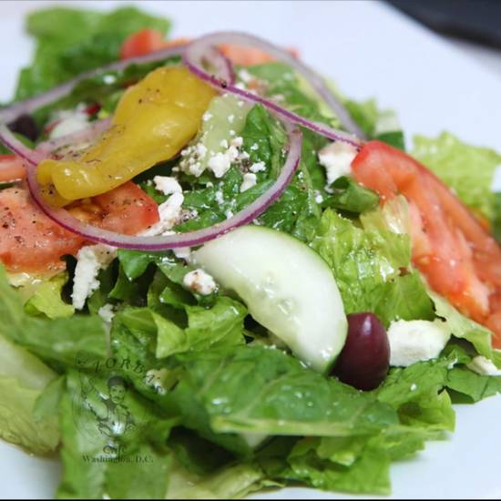 Order Greek Salad food online from Zorba Café store, Washington on bringmethat.com