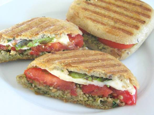 Order Caprese Panino Con Pesto Sandwich food online from Spaghetto store, Davie on bringmethat.com