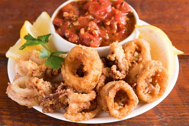 Order Fried Calamari food online from Red basil thai kitchen store, Long Island City on bringmethat.com
