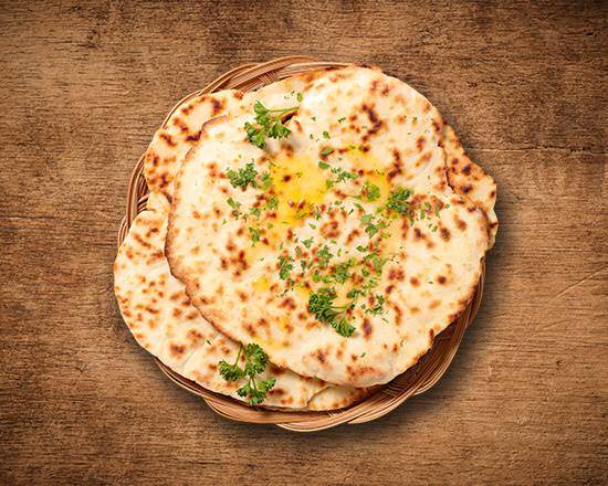 Order Butter Naan food online from United Kitchens Of India store, Schaumburg on bringmethat.com
