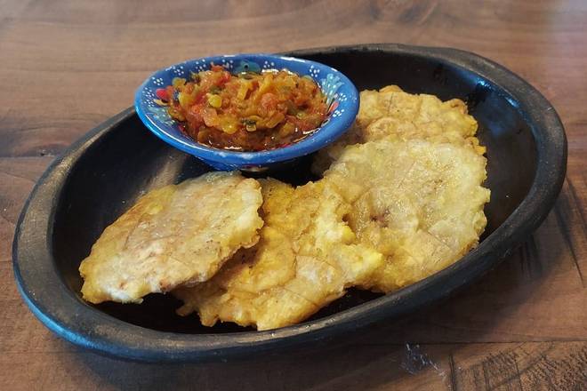 Order Patacones con salsa criolla- patacones with creole sauce food online from Medellin Restaurant store, Coconut Creek on bringmethat.com
