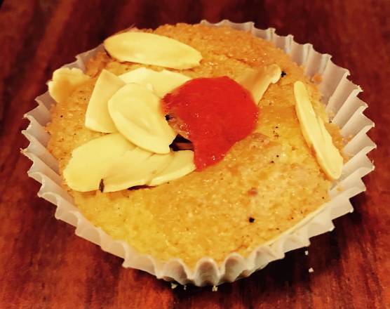 Order Almond Tea Cake food online from Sugar Bakery & Coffeehouse store, Seattle on bringmethat.com