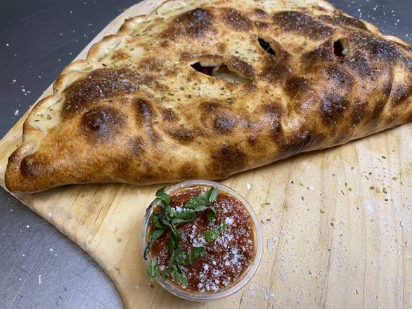Order Calzone food online from Mid City Pizza store, New Orleans on bringmethat.com