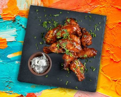 Order 40 pcs Classic Bone-in Wings food online from Black Bird Wings store, Oklahoma City on bringmethat.com