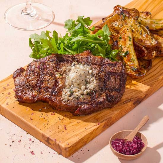 Order FIRE-GRILLED RIBEYE* food online from California Pizza Kitchen store, Honolulu on bringmethat.com