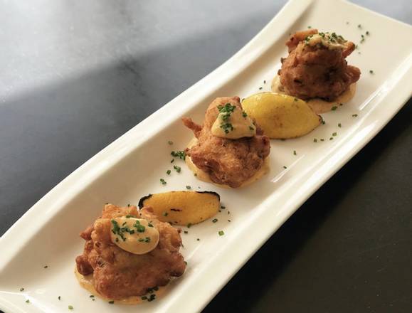 Order Conch Fritters food online from blu on the Avenue store, Winter Park on bringmethat.com