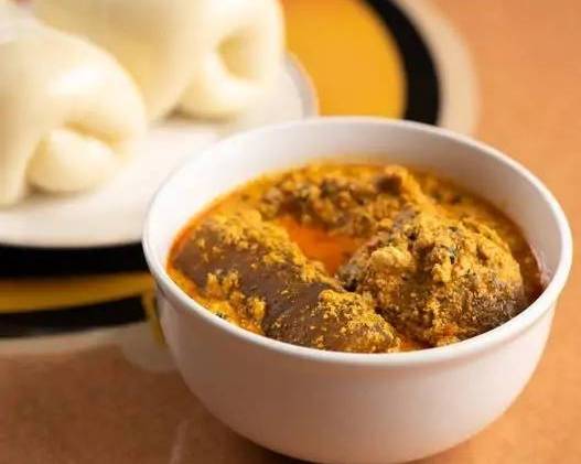 Order Egusi food online from Wazobia Kitchen store, Houston on bringmethat.com
