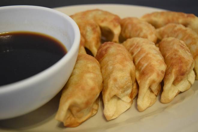 Order Chicken Pot Sticker (10 pcs) food online from Dragonfly store, Centralia on bringmethat.com